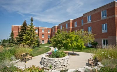 Outdoor view of the Villa St. Francis building and garden