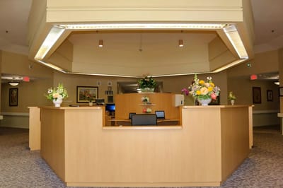Interior of the reception area with floral arrangements
