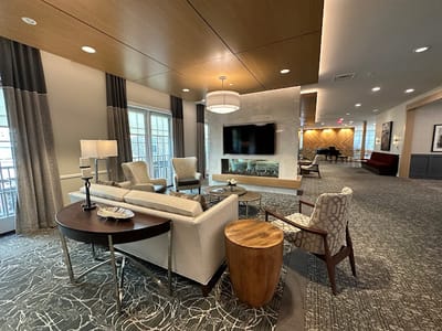 Interior common area with seating and television