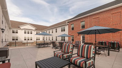 Outdoor seating area with umbrellas at the facility
