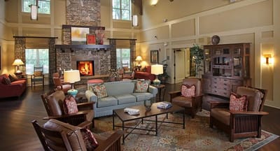 Cozy common area with comfortable seating and a fireplace