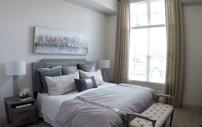 Brightly decorated private resident bedroom with natural light