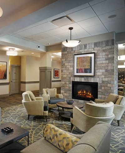 Common area with seating and a fireplace