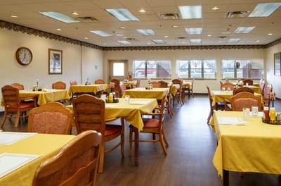 Dining room with tables set for meals