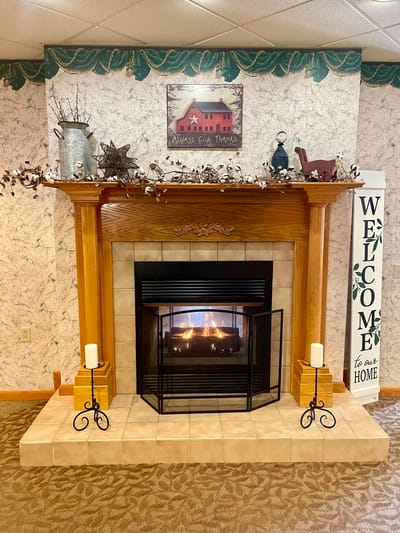Cozy fireplace with decorative elements in a common area