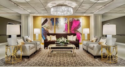 Elegant interior common area with seating and artwork