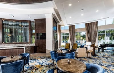 Interior common area with seating and piano