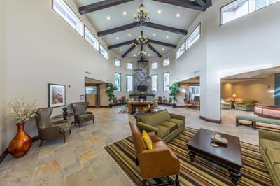 Bright and inviting common area with seating and decor