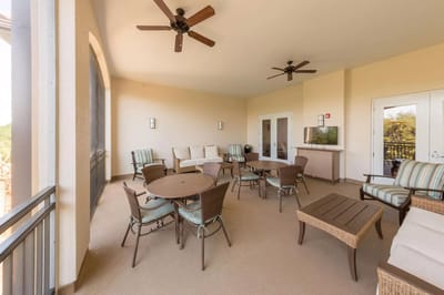 Bright common area with seating and tables