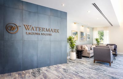 Interior lobby with the Watermark Laguna Niguel logo