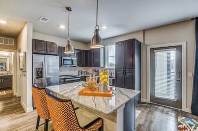 Modern kitchen interior with seating and decor