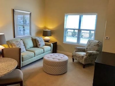 Cozy common area with seating and natural light