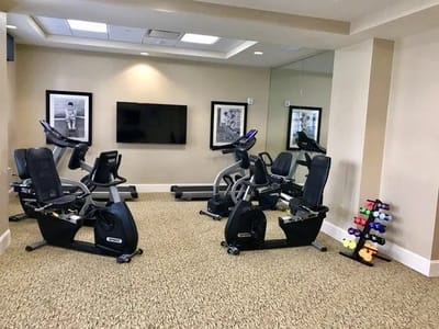 Well-equipped fitness room with exercise equipment