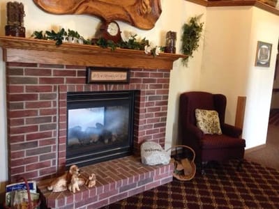 Cozy common area with a fireplace and seating