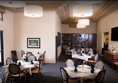 Dining room with neatly arranged tables and decor