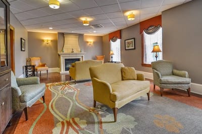 Bright common area with comfortable seating and decor
