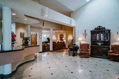 Bright interior of a senior living facility lobby