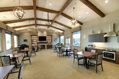 Bright dining area with tables and chairs