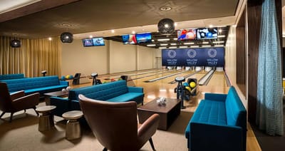 Interior view of a bowling alley with seating