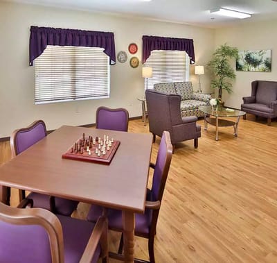 Interior common area with seating and a chess set