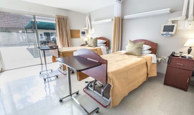 Interior view of a resident room with two beds
