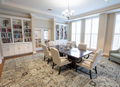 Bright and inviting activity room with a large table