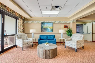 Bright common area with seating and artwork