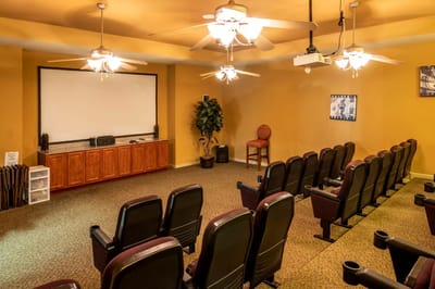 Cozy movie theater room with seating