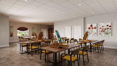 Bright, spacious art activity room with easels