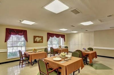 Bright dining area with tables set for meals
