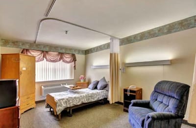 Private resident room with furnishings and window