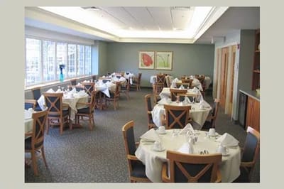 Dining room with tables set for meals