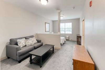 Cozy living area in a resident room with furniture