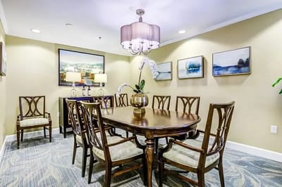 Interior dining area with a wooden table and chairs