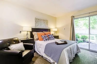 Bright, welcoming private resident room with a view