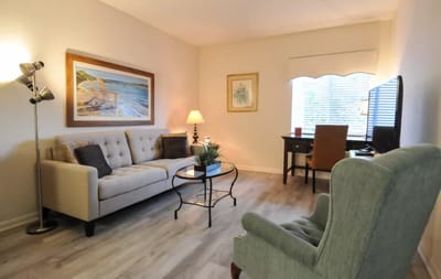 Cozy interior living space with seating and artwork