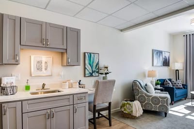 Bright interior of a cozy living area with kitchenette