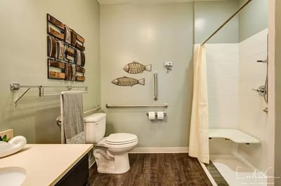 Bright, clean bathroom with decorative accents