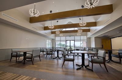 Bright dining room with modern decor and natural lighting