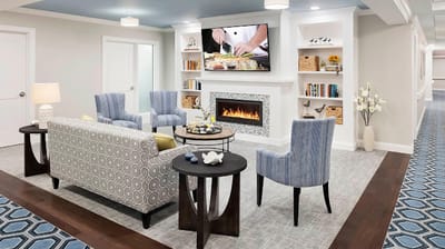 Bright common area with comfortable seating and decor