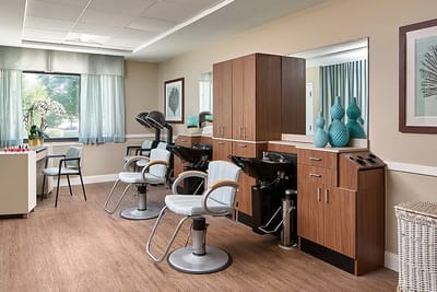 Hair salon area with styling chairs and modern decor