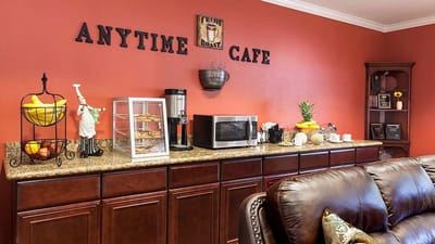 Interior view of a cafe area with seating and snacks