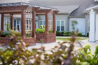 Outdoor space with planters and seating areas
