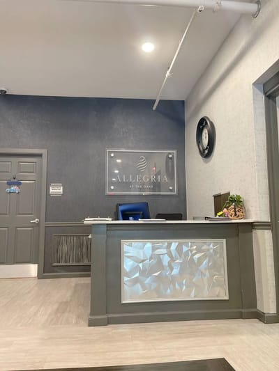 Reception area with a modern front desk