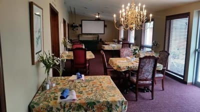 Interior dining area with floral tablecloths
