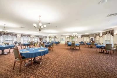 Bright, spacious dining room set for meals