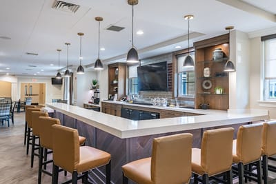 Interior lounge area with bar seating and modern decor
