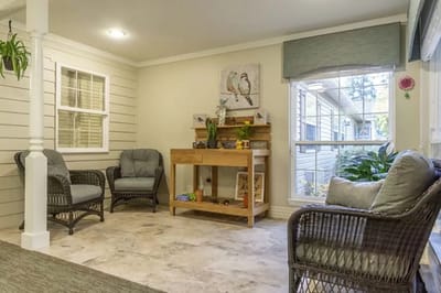 Bright common area with comfortable seating and decor
