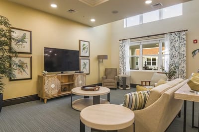 Bright common area with seating and decor
