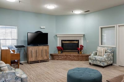 Interior common area with seating and fireplace